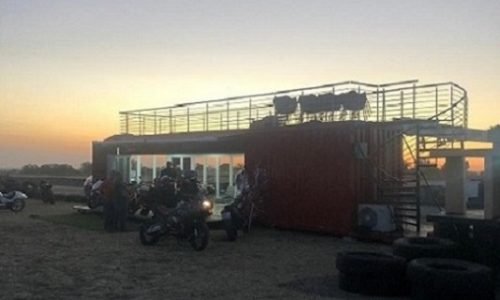 Motorbikers enjoying their evening with their modified shipping container