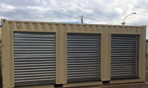 Shipping container storage units with roller doors